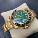 Rolex GMT-Master II Gold / Green Dial - Image 2