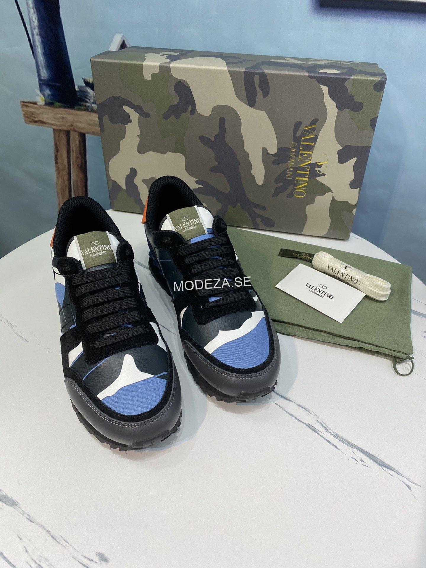 73cbcff7 Valentino Garavani Rockrunner Camouflage Trainers In Nappa Fabric - Image 1