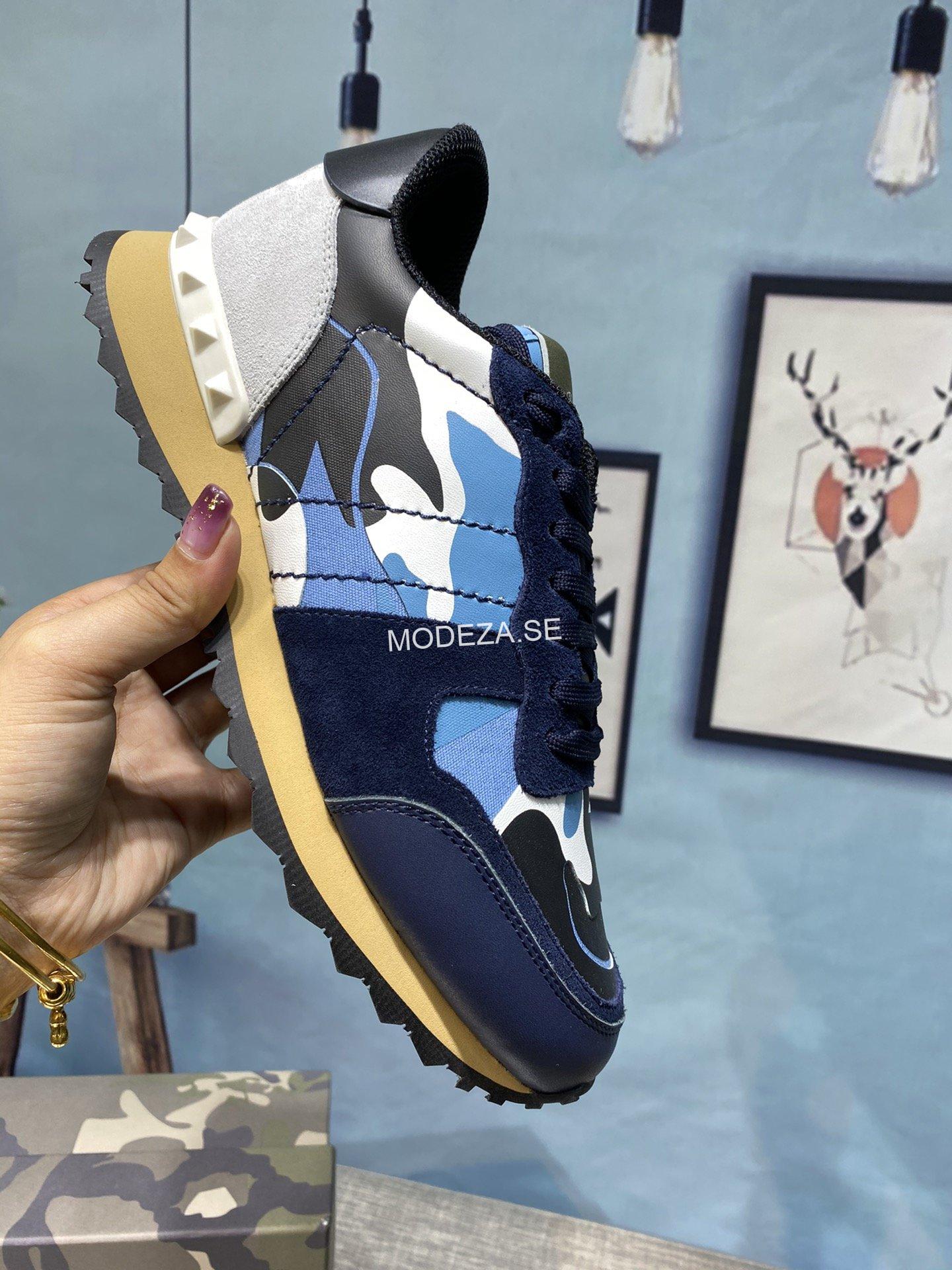 e0740dd2 Valentino Garavani Rockrunner Camouflage Noir Metallic Blue Sneaker - Image 1